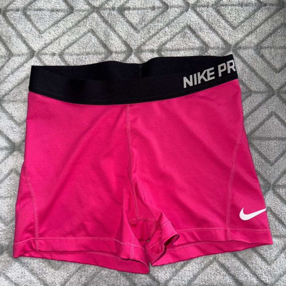 Nike Women's Hot Pink Athletic Compression Shorts with Black Waistband
